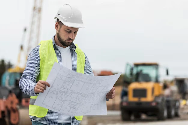 Ingeniero supervisando obra de construcción Ingeniero supervisando obra de construcción